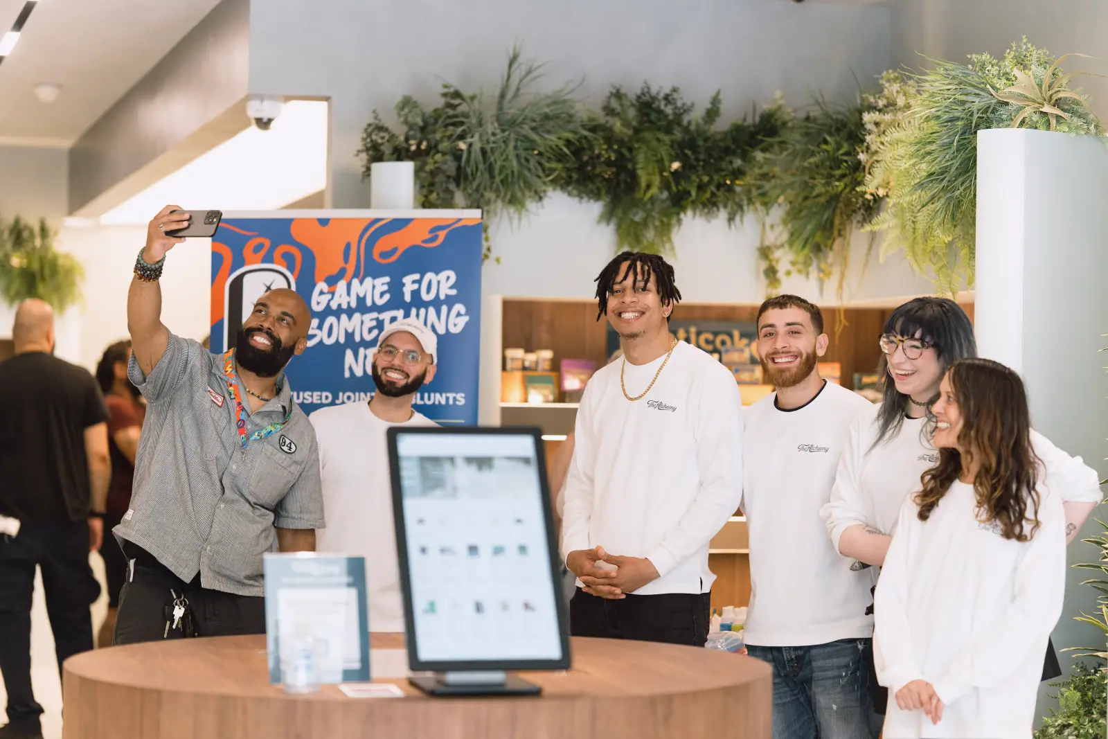 Alchemy Flatiron staff and customer
